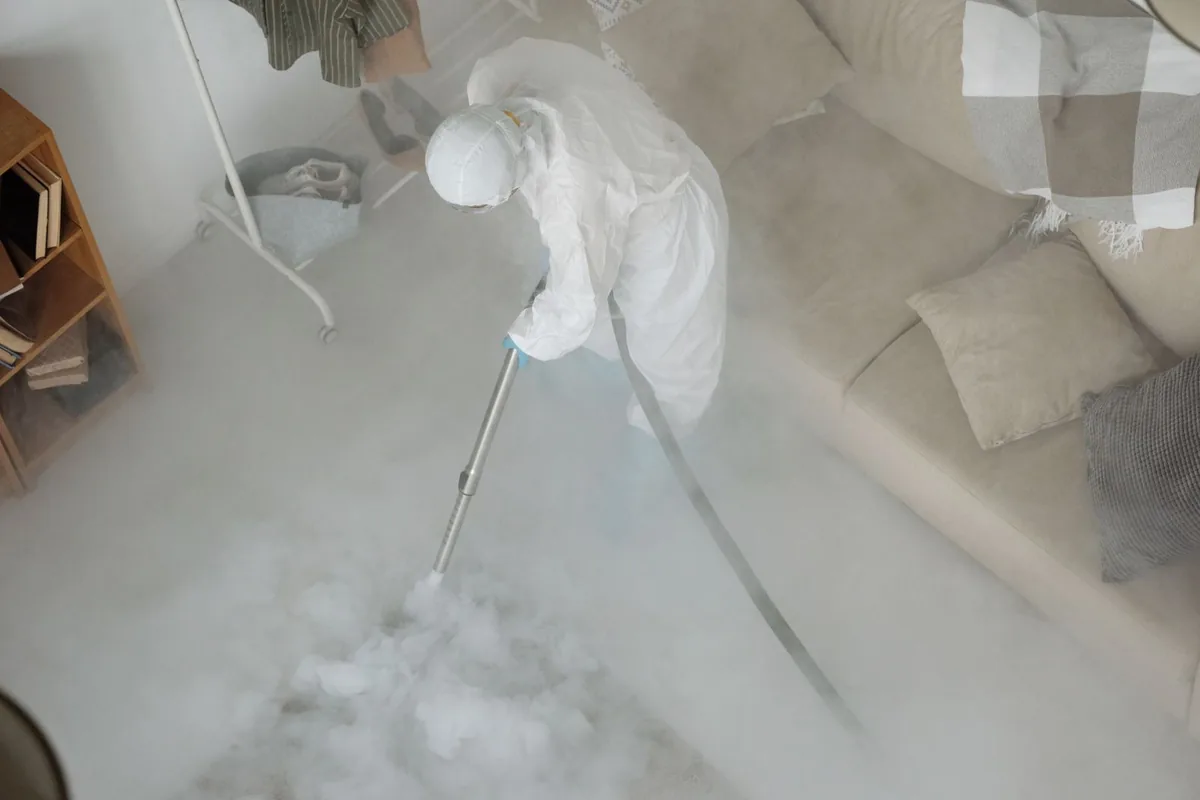 Biohazard cleanup technician in protective equipment, Audubon, Louisville, KY